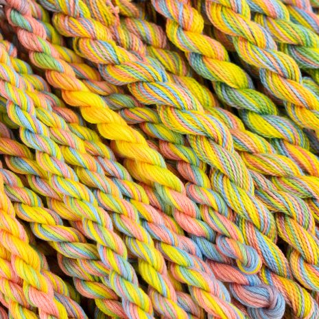 Colour Complements hand dyed embroidery thread. Colour 23 is a blend of yellow, blue, and pink for Easter