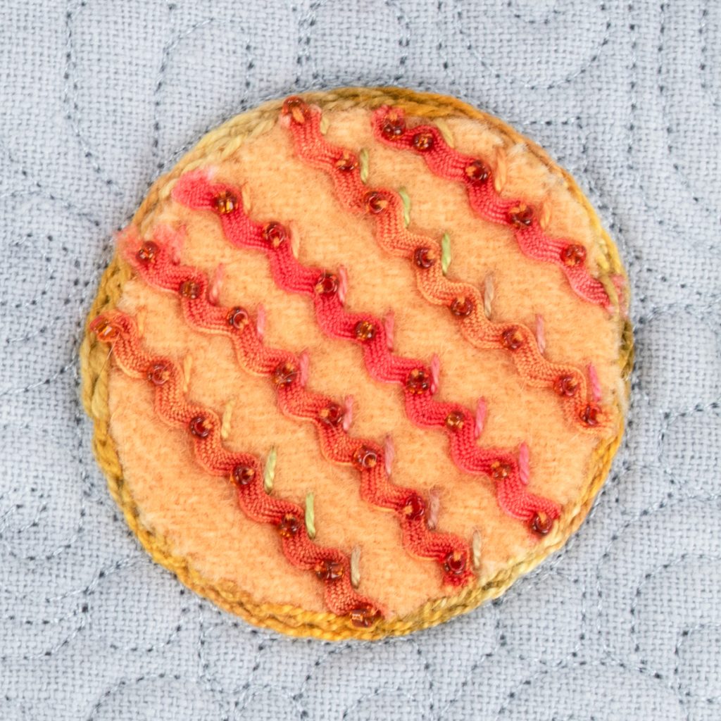 Keeping It Simple With This Baby Pink Wool Applique