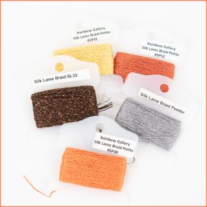 Rainbow Gallery Silk Lame Braid Petite thread in orange, gold, brown, and silver