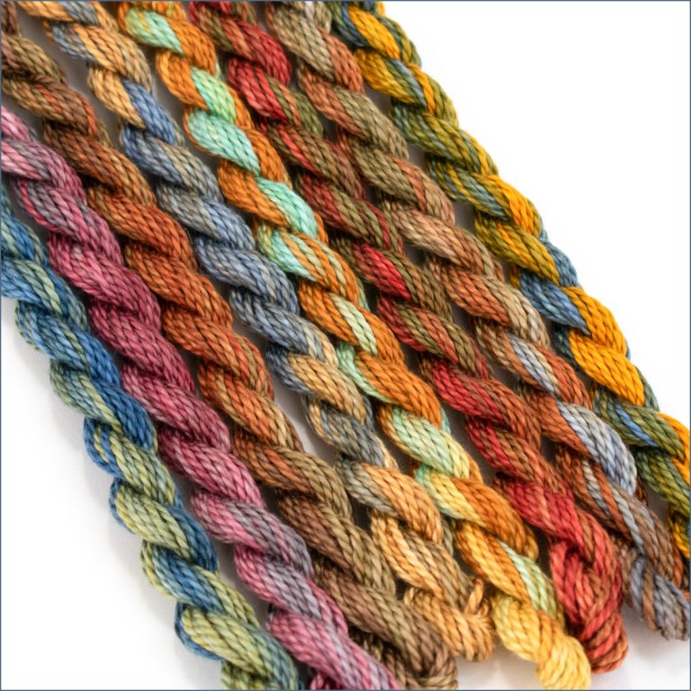 Size 3 perle cotton sampler in variegated earth tones.