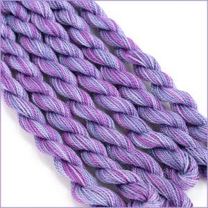 Size 5 Perle Cotton thread in shades of purple, and red violet