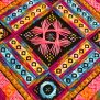 Colour Me Brilliant thread kit detail: intricate geometric embroidery in vibrant pink, blue, and orange hues.
