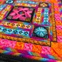 Close-up of colourful embroidery from the Colour Me Brilliant thread kit