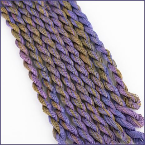 A variegated purple and green blend of perle cotton