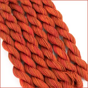 Fall blend perle cotton threads in shades of orange and golden brown