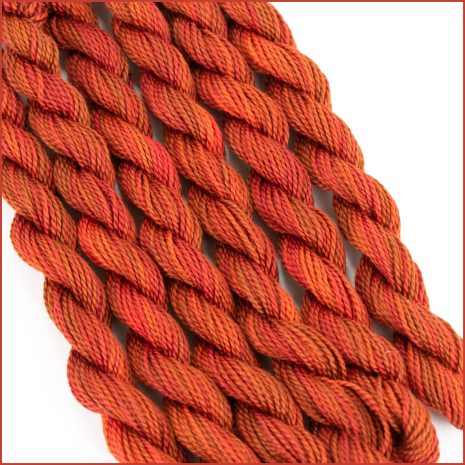 Fall blend perle cotton threads in shades of orange and golden brown