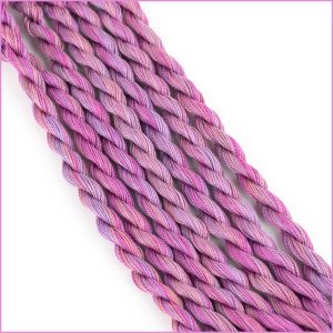 Perle cotton size 12 thread in shades of muted pink and purple