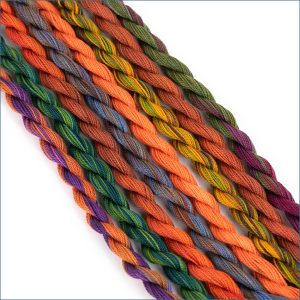 Assortment of size 12 perle cotton threads in autumnal colors